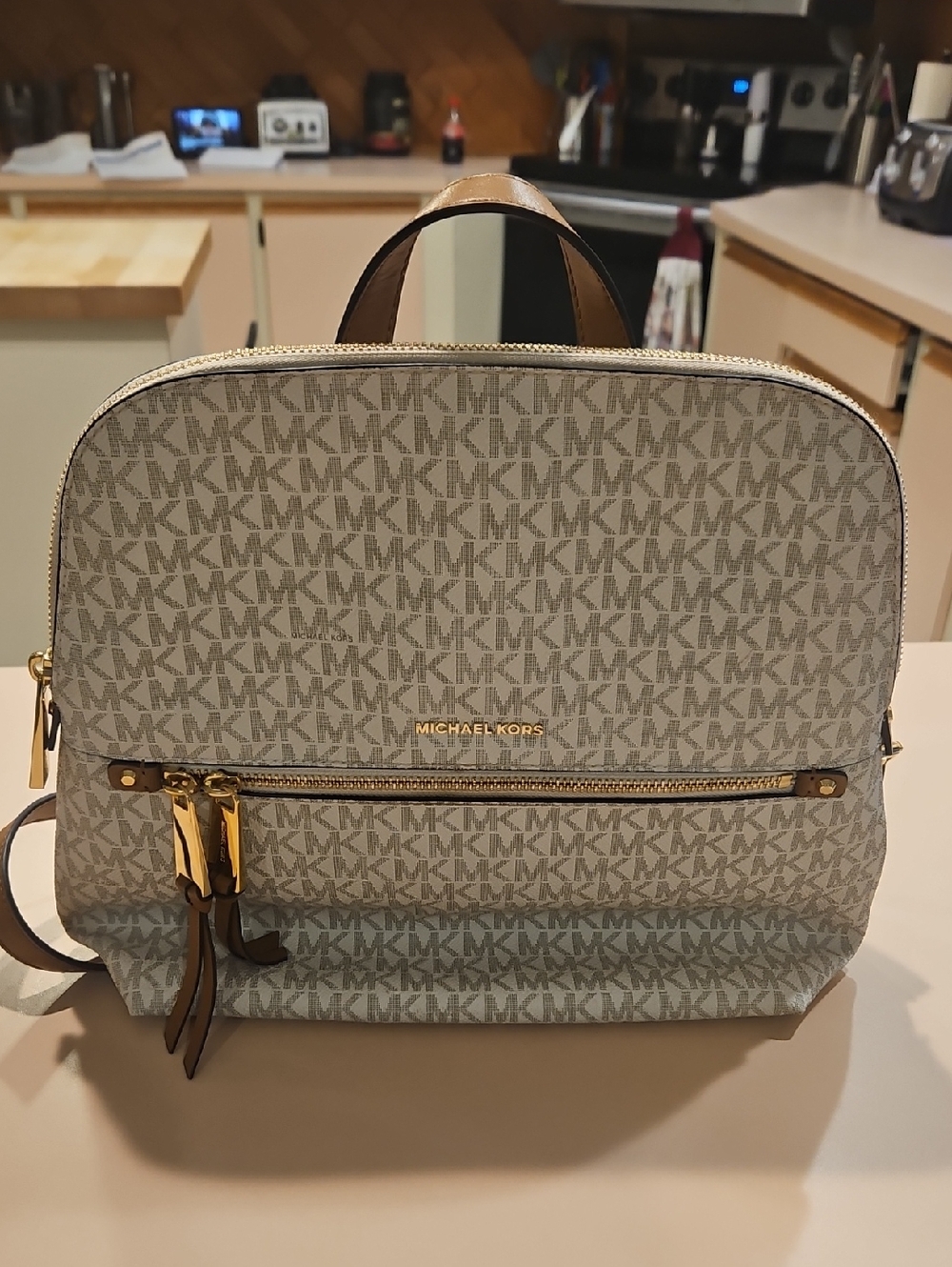 Michael Kors Monogram Slim Backpack in Light Beige and Tan Trim